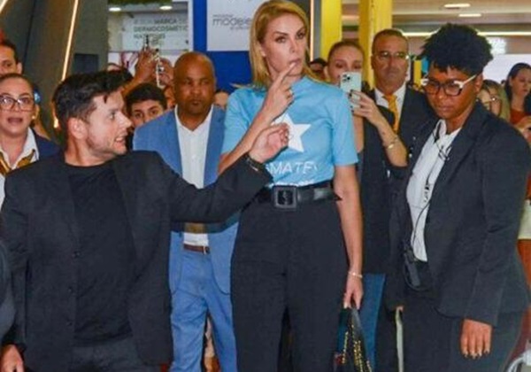 Ana Hickmann chega cercada por seguranças em evento; confira