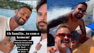 Willian José ao lado de cantores durante passeio de lancha
